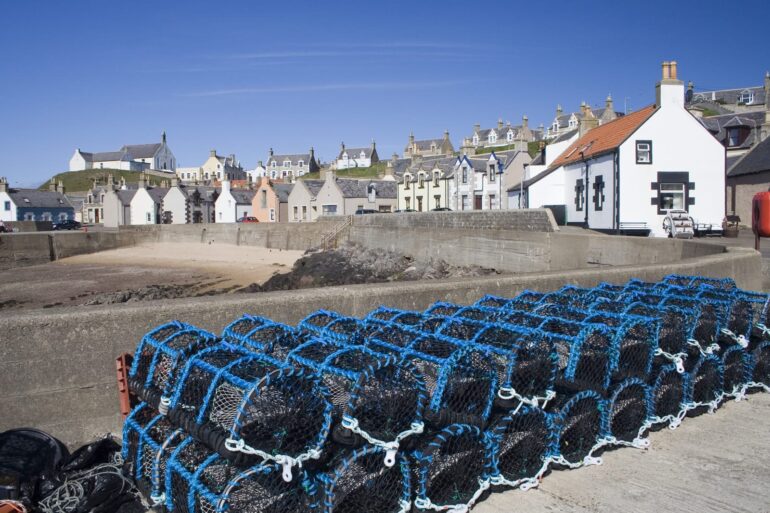 84623202 creel ppots on the quay at cullen harbour