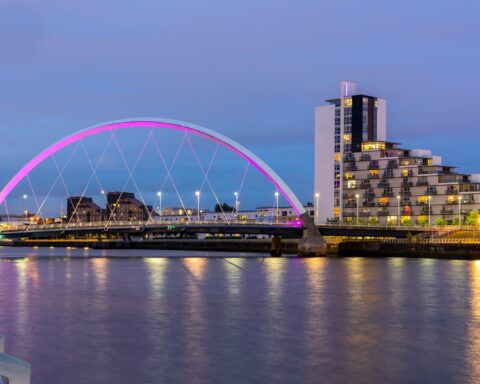 Clyde Arc Bridge along River Clyde Sunset twilight at Glasgow city Scotland UK.