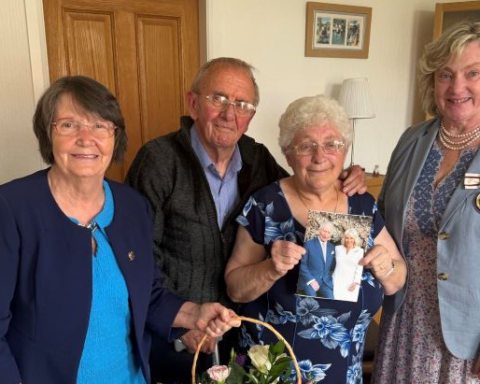 Midlothian Councillor Ellen Scott, on the left, and Depute Lord Lieutenant Harriet Dalrymple visited Wallace and Susan Clark at their home.