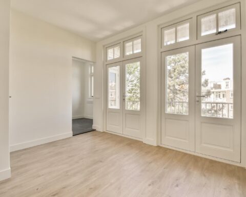 Empty room with window and radiator