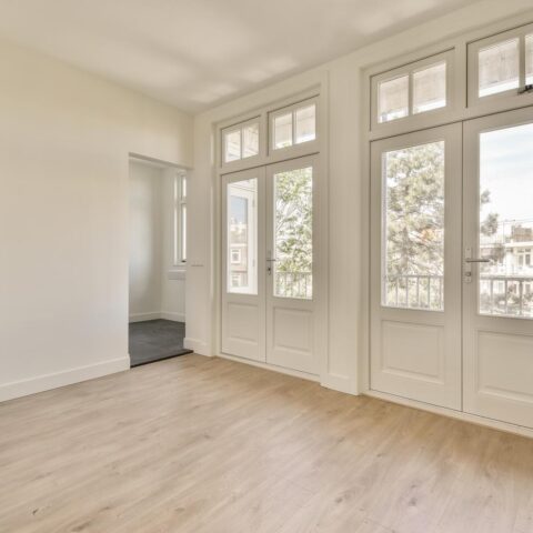 Empty room with window and radiator