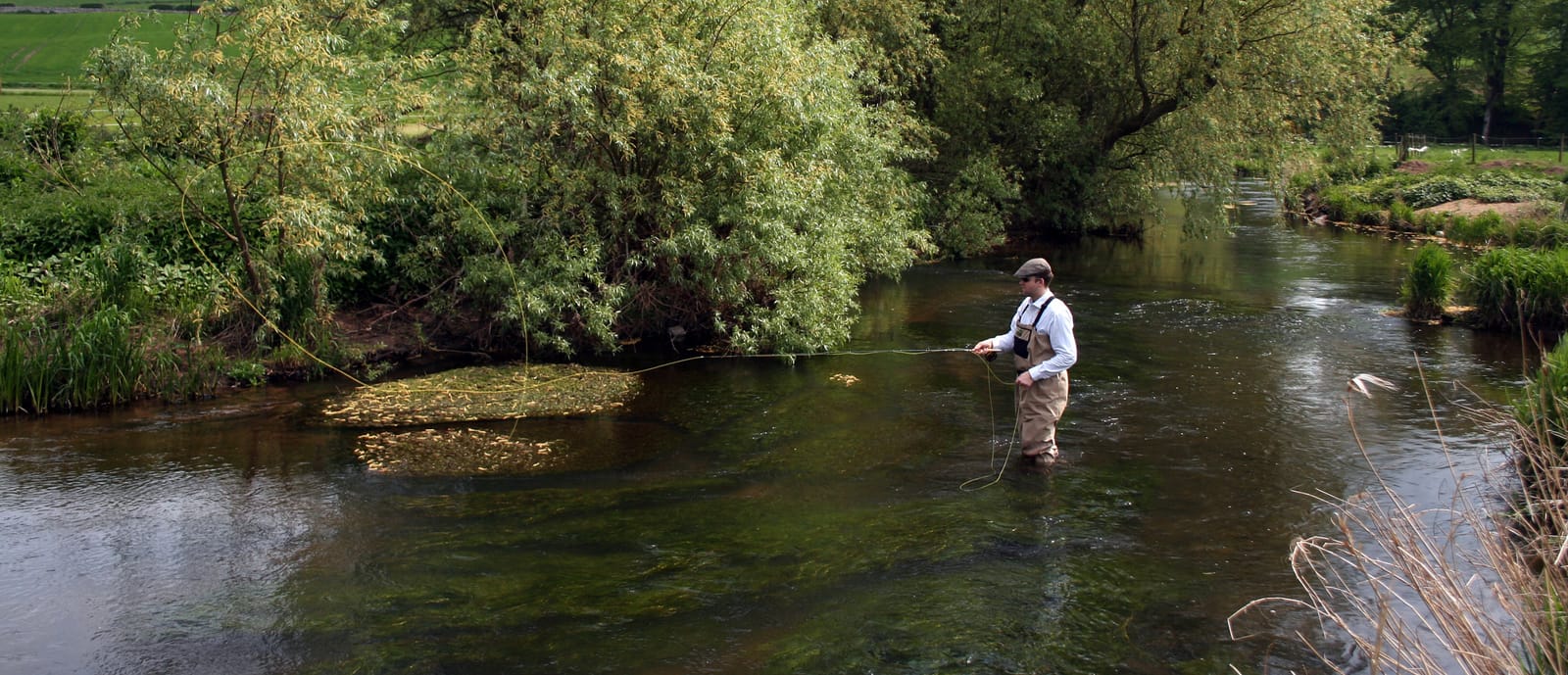 Fly fishing in the River Eden, Scotland