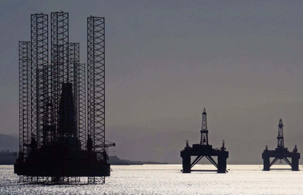 North Sea oil platforms stand waiting in the Cromarty Firth near Invergordon, Scotland