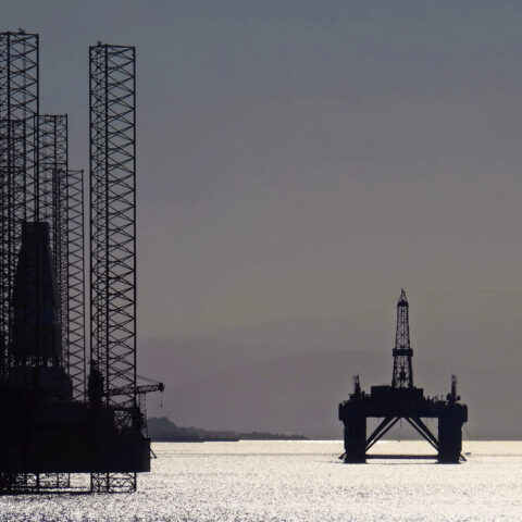 North Sea oil platforms stand waiting in the Cromarty Firth near Invergordon, Scotland
