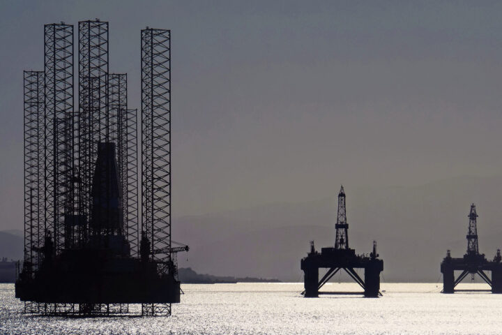 North Sea oil platforms stand waiting in the Cromarty Firth near Invergordon, Scotland