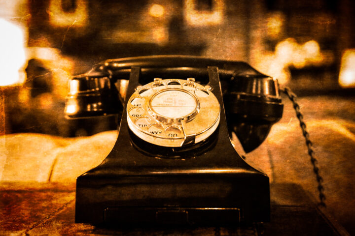 10136160 detail view of old vintage dial telephone on the table
