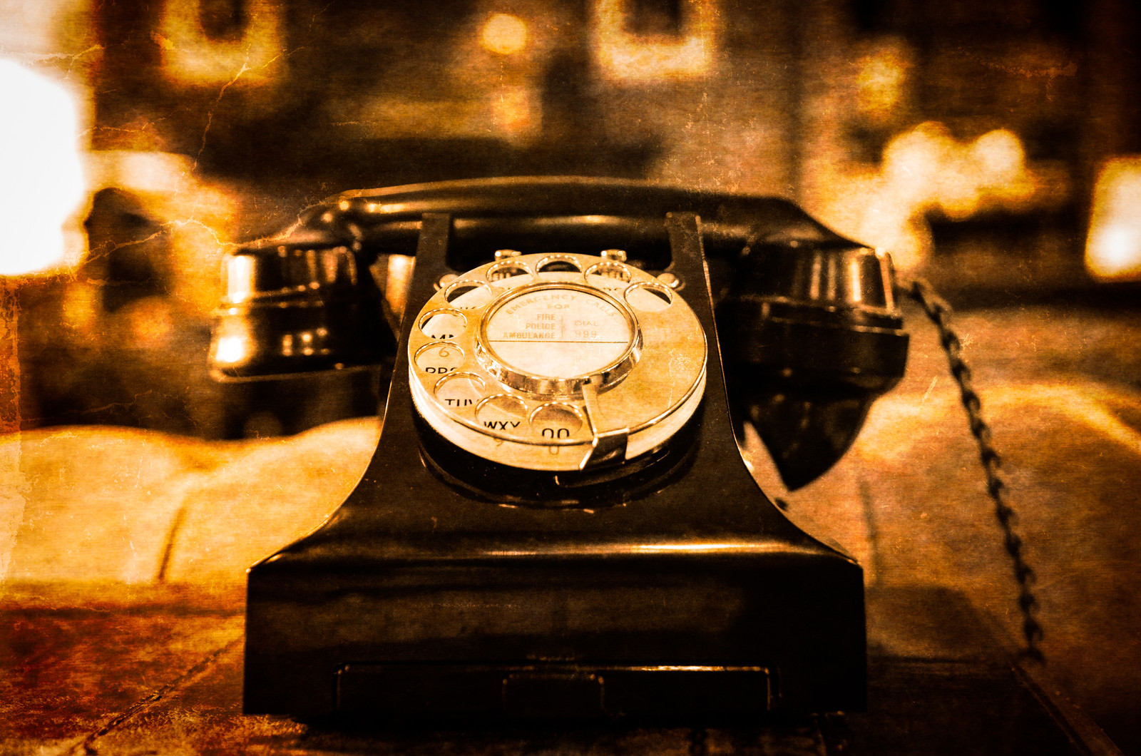 10136160 detail view of old vintage dial telephone on the table