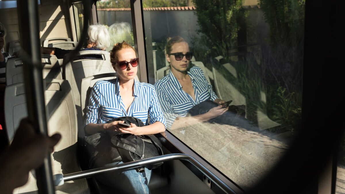 76771046 portrait of tired woman sleeping on bus