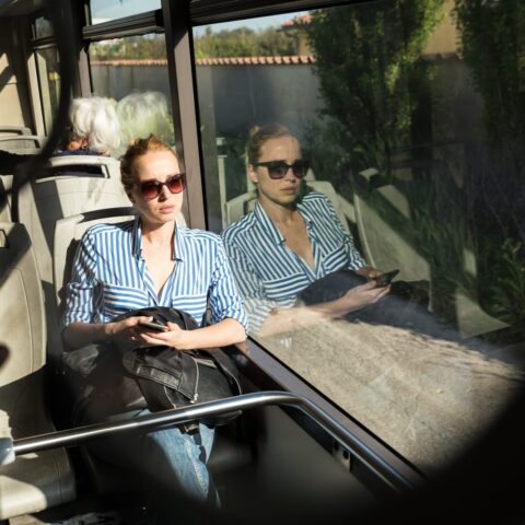 76771046 portrait of tired woman sleeping on bus