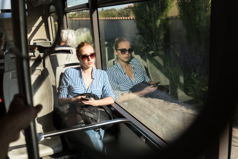 76771046 portrait of tired woman sleeping on bus