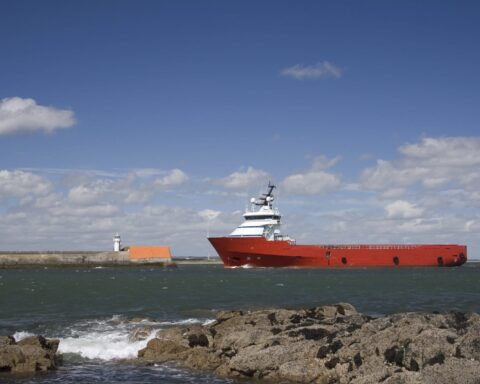Oil vessel returning to Aberdeen Harbour, Scotland