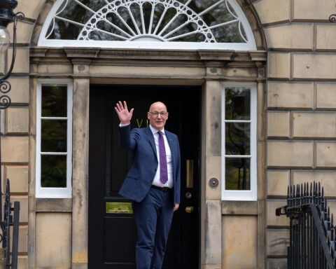 First Minister John Swinney outside Bute House in Edinburgh. His government plans to replace Scotland's 14 territorial NHS boards with two strategic authorities, although the full